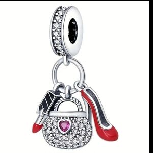 Silver Charm with Red Accents